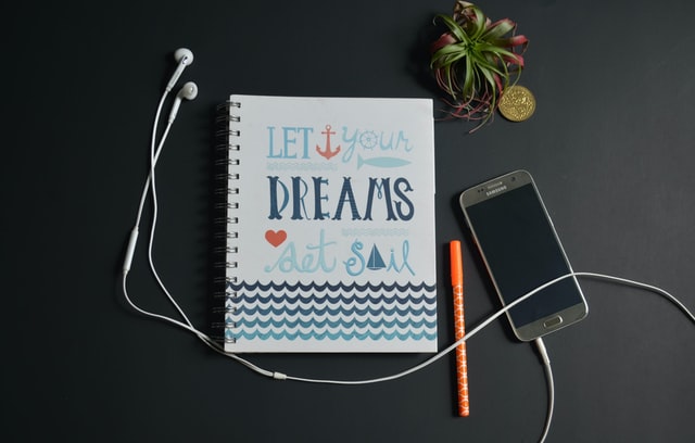 Go-for-your-dreams-notebook-planning-for-success-reasons-to-apply-to-Author-mentor-match-process-susan-shiney-kelli-stirrett-unsplash